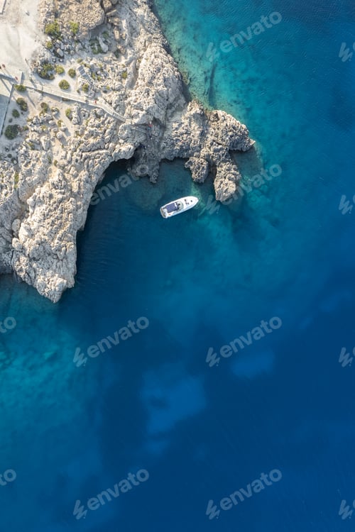 Preview: Drone aerial photograph of Cape Greko peninsula with Agioi Anargyroi church on the rocks. Cruise
