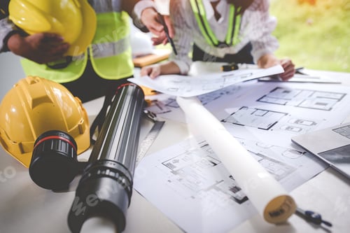 Preview: architect concept, working architect with blueprints in office to present to customers