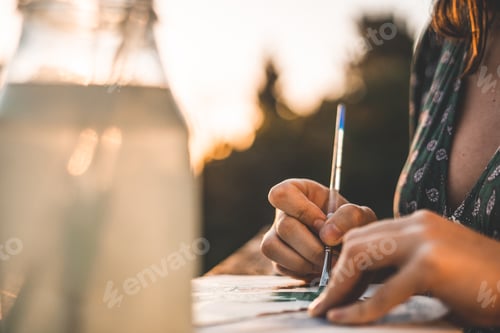 Preview: Woman painting on terrace
