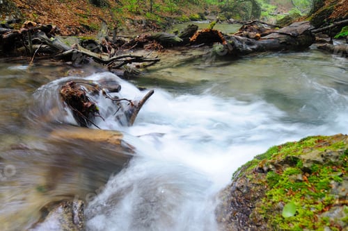 Preview: Stream with waterfall and mossy stones around