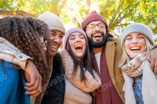 Preview: Cheerful group of friends taking selfie. Happy people having fun together outdoors.