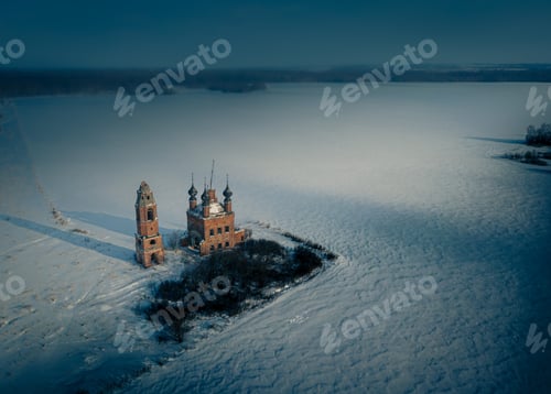 Preview: Aerial view of a semi-destroyed abandoned church in the dark winter in the Yaroslav region, Russia