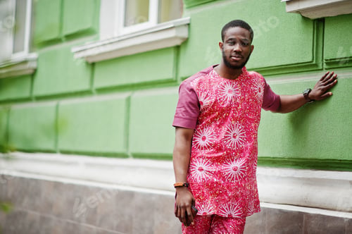 Preview: Black young man wearing african traditional clothes