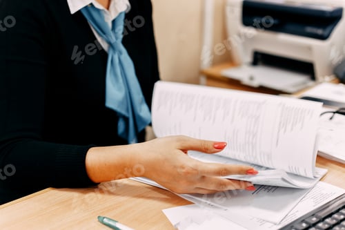 Preview: woman working with paper