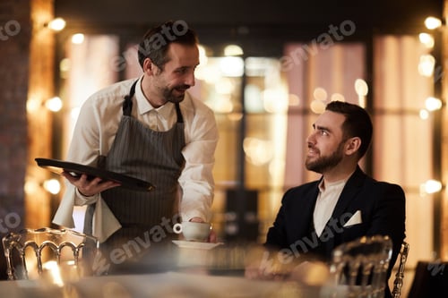 Preview: Waiter Bringing Coffee to Guest