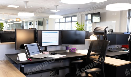 Preview: Empty open space office with desks, chairs and computers