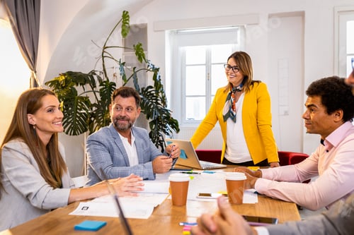 Preview: Group of business people working in office.