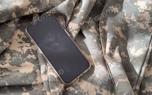 Preview: Blank mobile phone on military equipment, template for SMS, Ukrainian Armed Forces