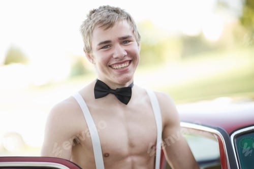 Preview: Teenage boy in bow tie and suspenders