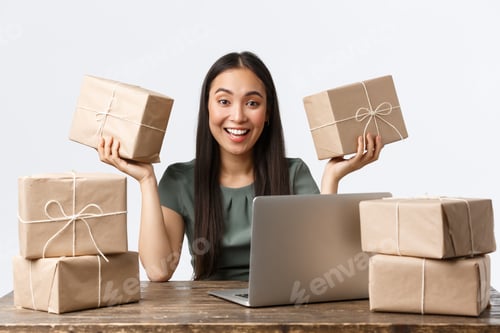 Preview: Small business owners, startup and e-commerce concept. Excited asian female entrepreneur sitting at