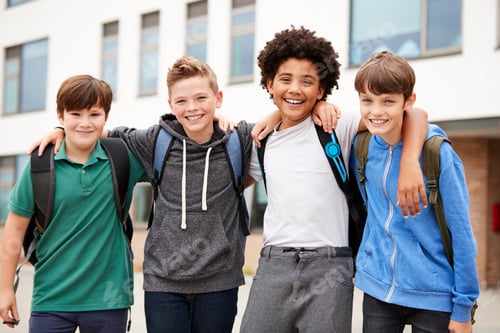 Preview: Portrait Of Male High School Student Friends Standing Outside School Buildings