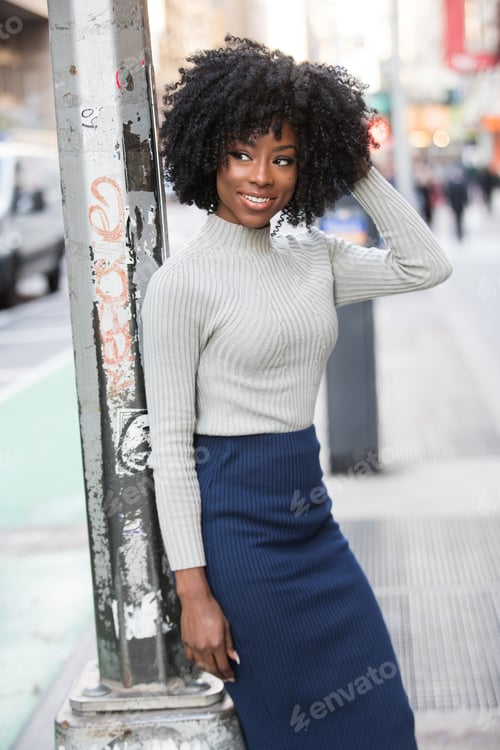 Preview: African American woman outside in city
