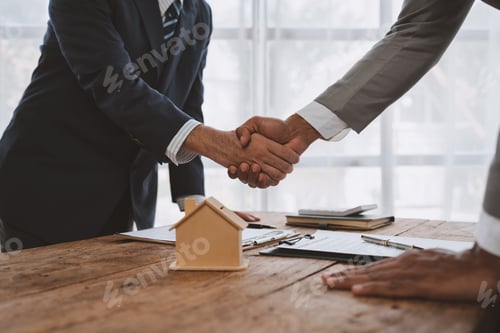 Preview: Handshake of real estate brokers with customers or investors, mortgage loan agreements Make a lease-