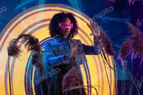 Preview: Metaverse digital cyber world technology, woman with virtual reality VR goggles playing augmented