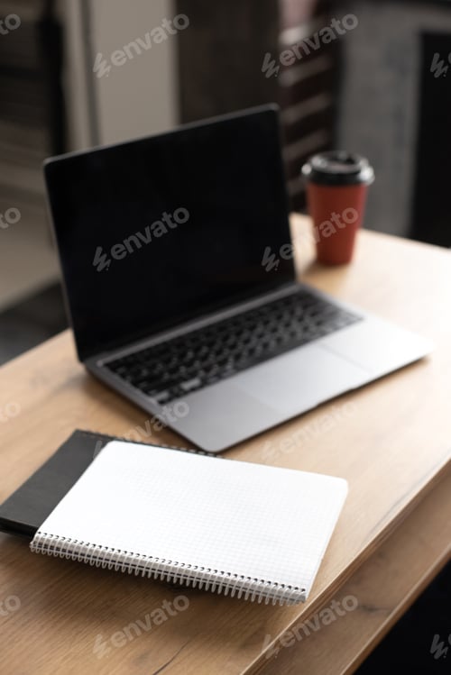 Preview: Workplace table in office or home for freelancer or manager working on laptop
