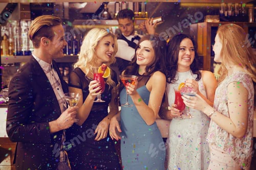 Preview: Attractive Friends Drinking Cocktails Together Against Flying Colours