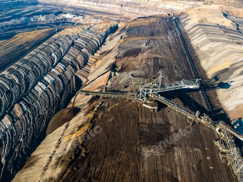Preview: Mining equipment in a brown coal open pit mine near Garzweiler, Germany. Aerial View