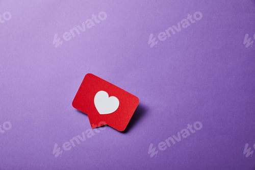 Preview: card with like sign on purple surface
