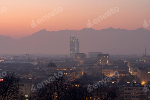 Preview: Panoramic, evening shot of the city in the Piedmont area, Turin, Italy, with mountain views
