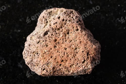 Preview: sample of raw brown pumice mineral on black