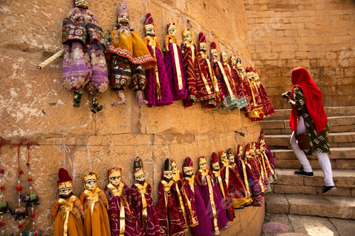 Preview: Woman tourist at golden fort Jaisalmer, India.