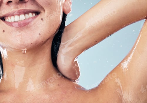Preview: Shower, smile and woman in studio for body care, wellness and cleaning on blue background. Hygiene,