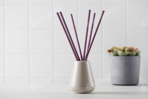 Preview: Vase and incense sticks. Interior perfume concept. Copy space.