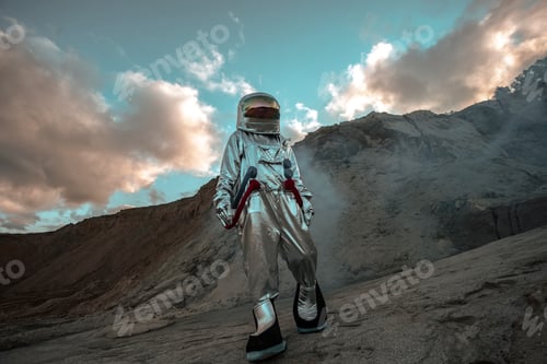 Preview: Spaceman exploring nameless planet, walking in a dust cloud