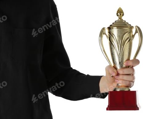 Preview: Woman with golden trophy cup on white background, closeup