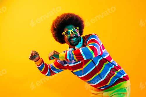 Preview: African man portrait in studio on colorful background