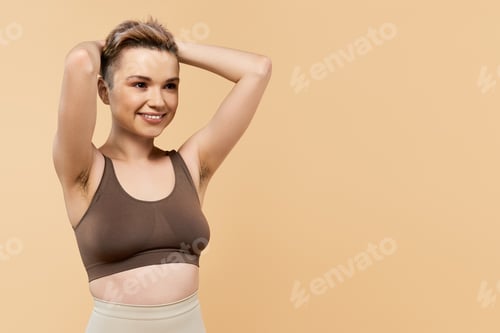 Preview: Smiling Woman in a Brown Top Posing