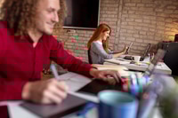 Preview: Designer working in modern office