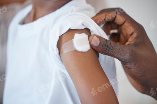 Preview: Shot of an unrecognizable doctor applying a cotton ball to a patients arm at a hospital