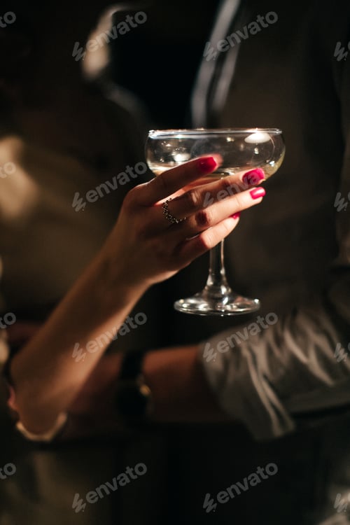 Preview: Romantic dinner. Couple cheers with white wine