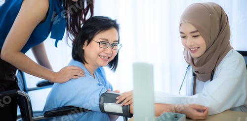Preview: senior woman patient and young woman doctor, friendly doctor encouragement