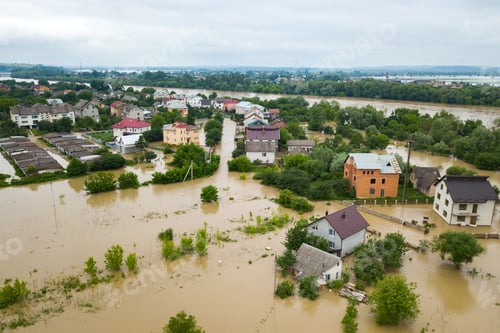 Preview: Aerial view of flooded houses with dirty water of Dnister river in Halych town, western Ukraine.