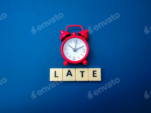 Preview: Red alarm clock with the word LATE