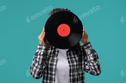 Preview: Young funny teenager girl with vinyl record disc. Hobby, Music Lover, Collection