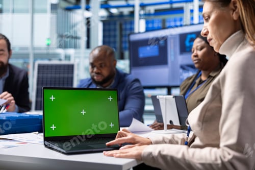 Preview: Factory experts uses mockup laptop to present research and development insights