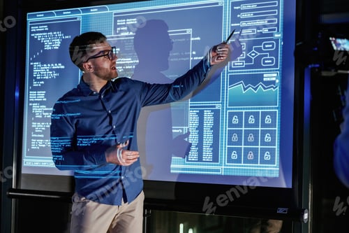 Preview: Business coach against projector with data