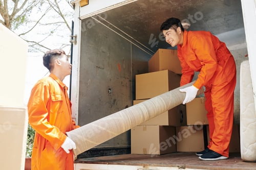 Preview: Two Men Working Together