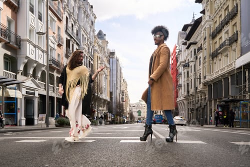 Preview: Gay couple crossing the street in urban city