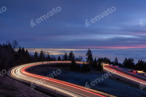 Preview: Road going up a mountain and Fog Covering the Modern City