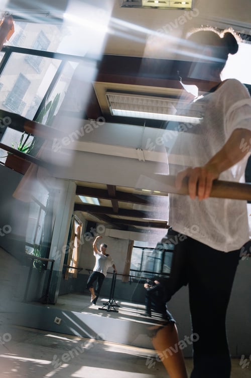 Preview: Ballet dancer practicing indoors.