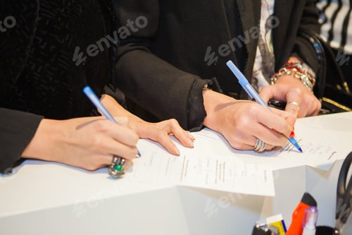 Preview: Women writing documents, signatures