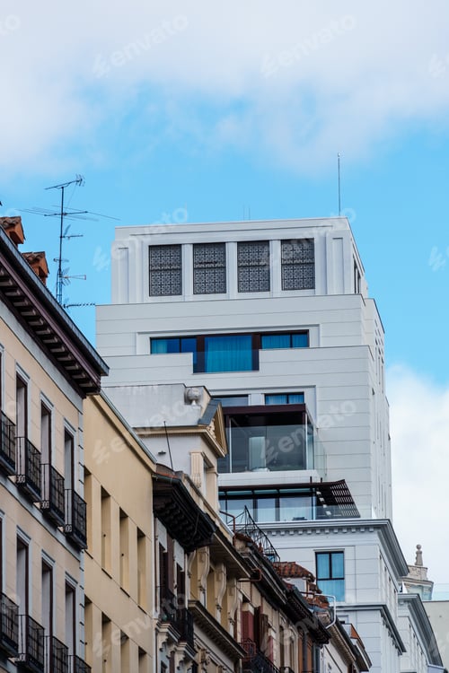 Preview: Low angle view of old residential building in central Madrid against sky