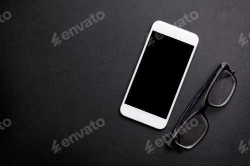 Preview: Smartphone on office workplace table