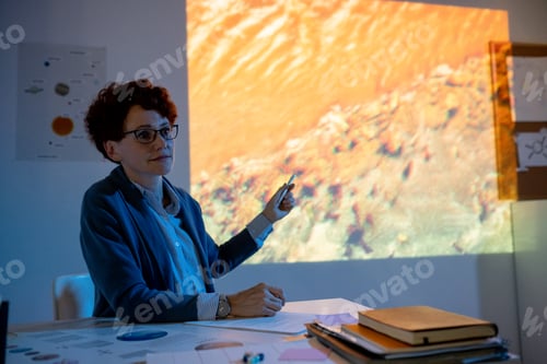 Preview: Confident young teacher making video presentation about pollution of environment