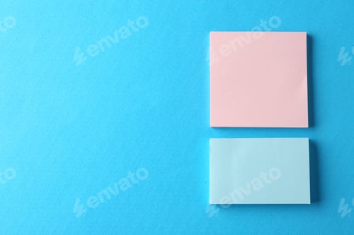 Preview: Blank colorful notes on light blue background, top view. Space for text