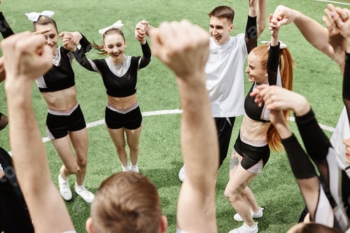 Preview: Group of cheerleaders cheering for sport team